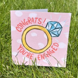 Recycled engagement greeting card. Ring with congrats you're engaged around it